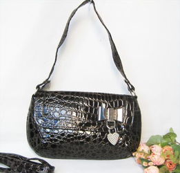 咖啡色格子手提斜挎韩版女包 批发指南与选购建议